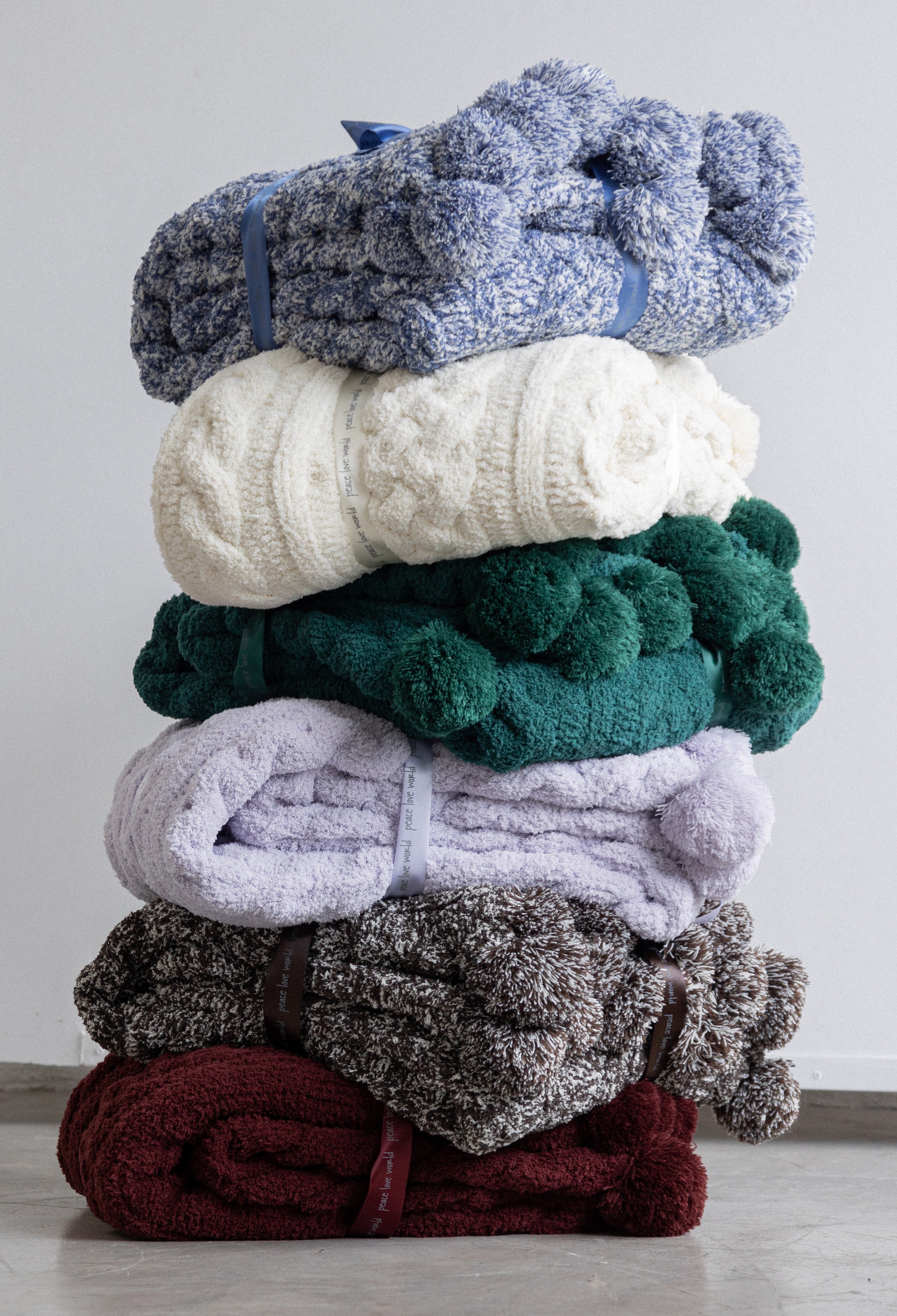 Pom Pom Cable Knit Blanket